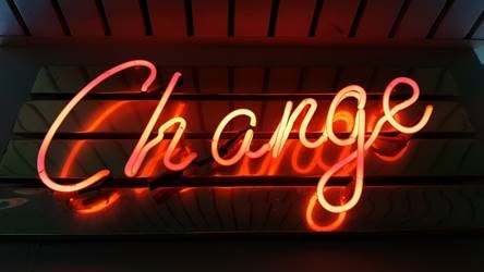 Lit up sign saying 'change'